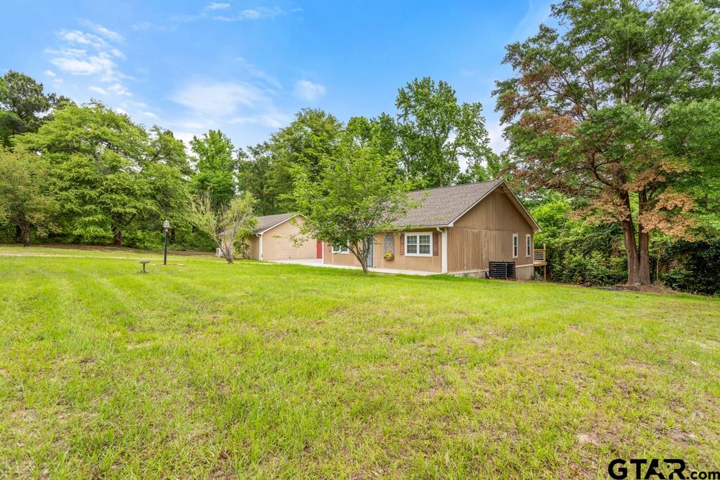 448 North Hill Road Tyler, TX 75706 - Photo 29 of 30 a front view of house with yard and green space