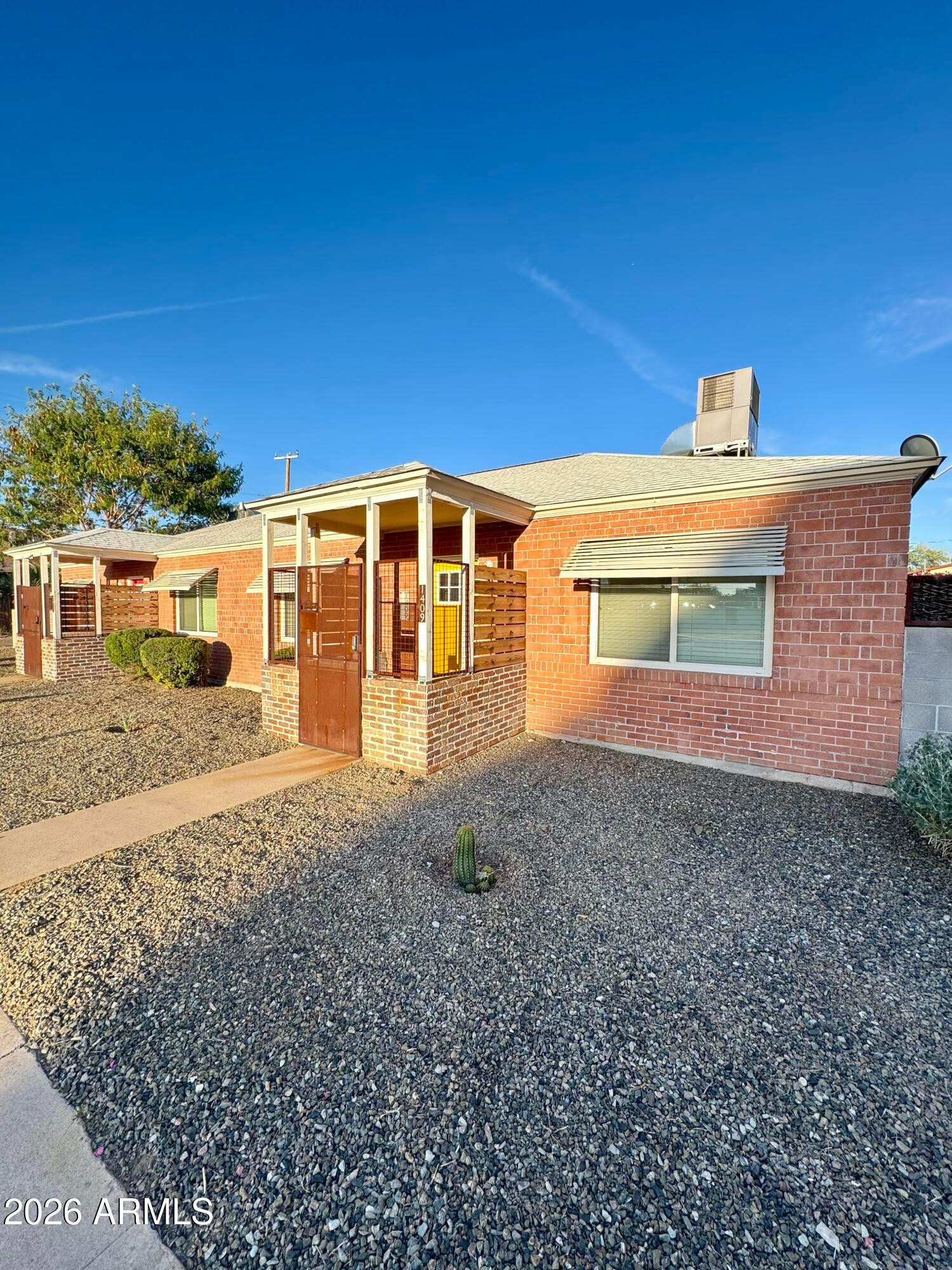 1401 North 5th Street Phoenix, AZ 85004 - Photo 1 of 9 a front view of a house with a yard