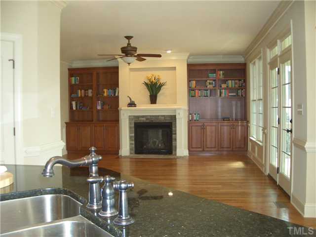 2809 Winter Song Road, Unit 2738 Raleigh, NC 27614 - Photo 6 of 12 Kitchen overlooks into the central Family Room for an expansive open design combining the Kitchen, Breakfast Room, Family Room and Casual Den into an ideal space for everyday living!!