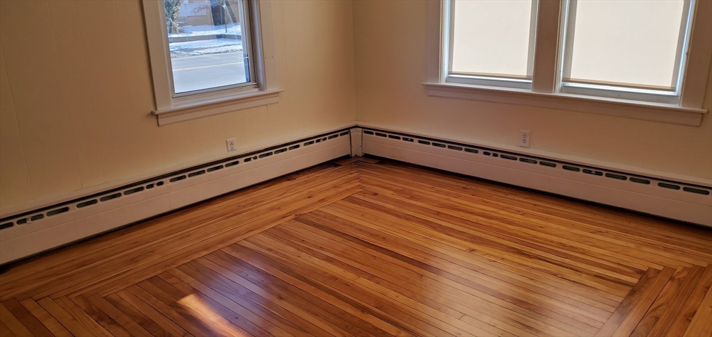 1260 Grafton Street Worcester, MA 01604 - Photo 22 of 42 a view of a room with wooden floor and windows