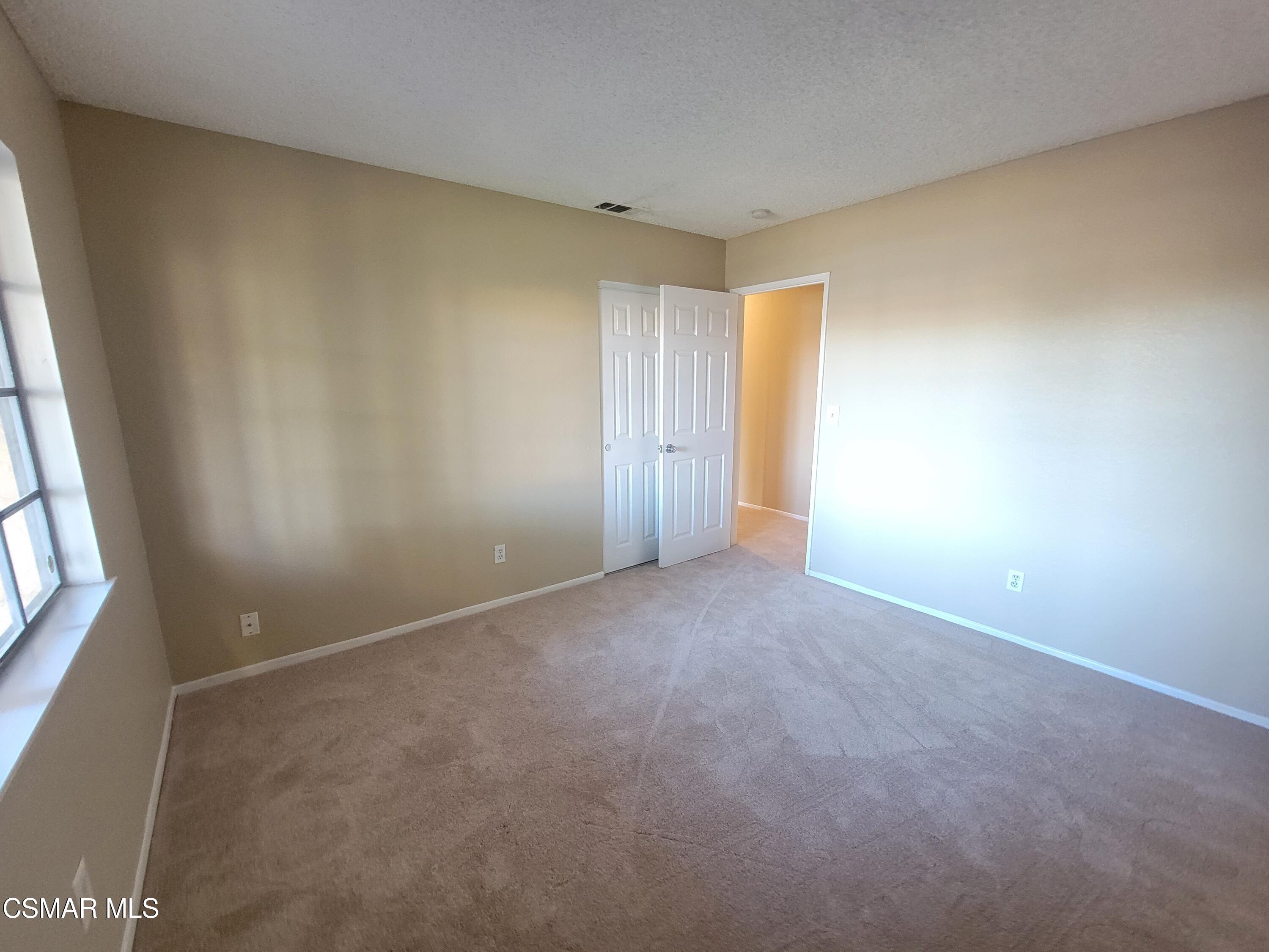 1200 Pasteur Drive Lancaster, CA 93535 - Photo 11 of 32 an empty room with windows