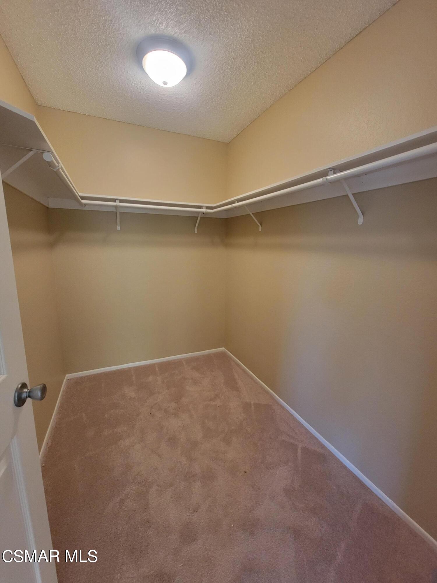 1200 Pasteur Drive Lancaster, CA 93535 - Photo 19 of 32 a view of a room with racks on the wall