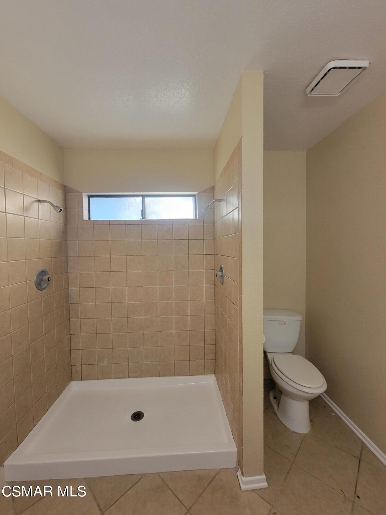 1200 Pasteur Drive Lancaster, CA 93535 - Photo 23 of 32 a bathroom with a shower and a toilet