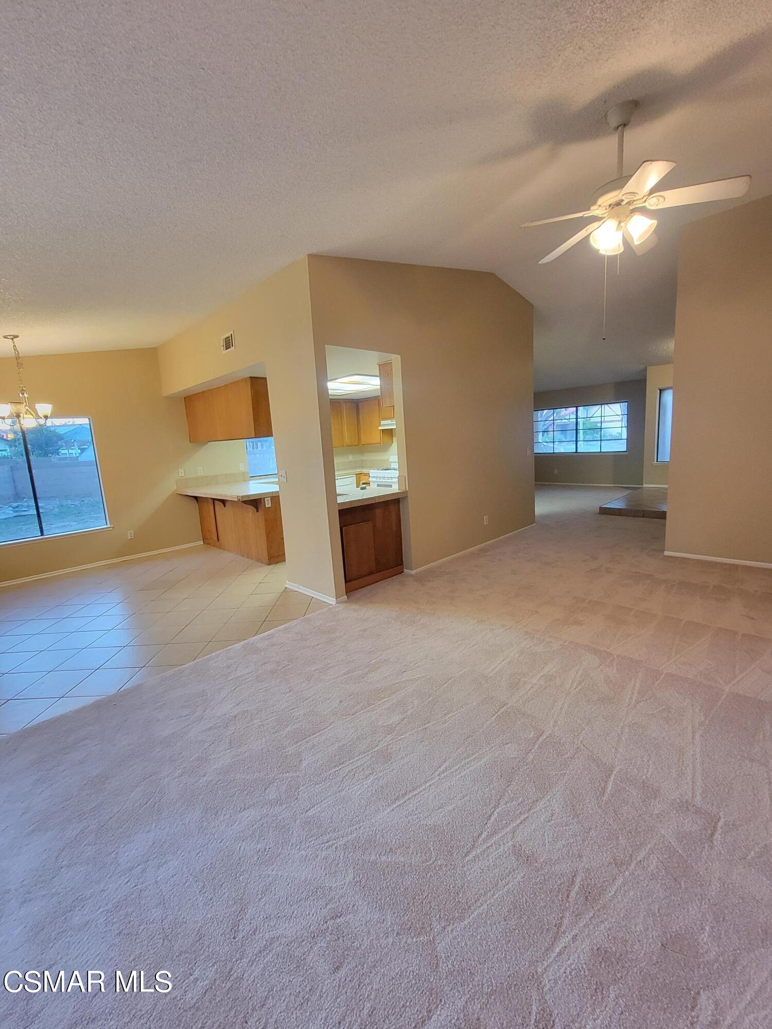 1200 Pasteur Drive Lancaster, CA 93535 - Photo 5 of 32 a view of an empty room with a window