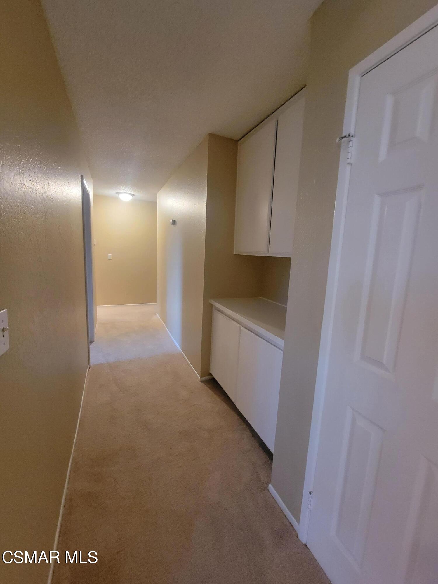 1200 Pasteur Drive Lancaster, CA 93535 - Photo 10 of 32 a view of a hallway to rooms