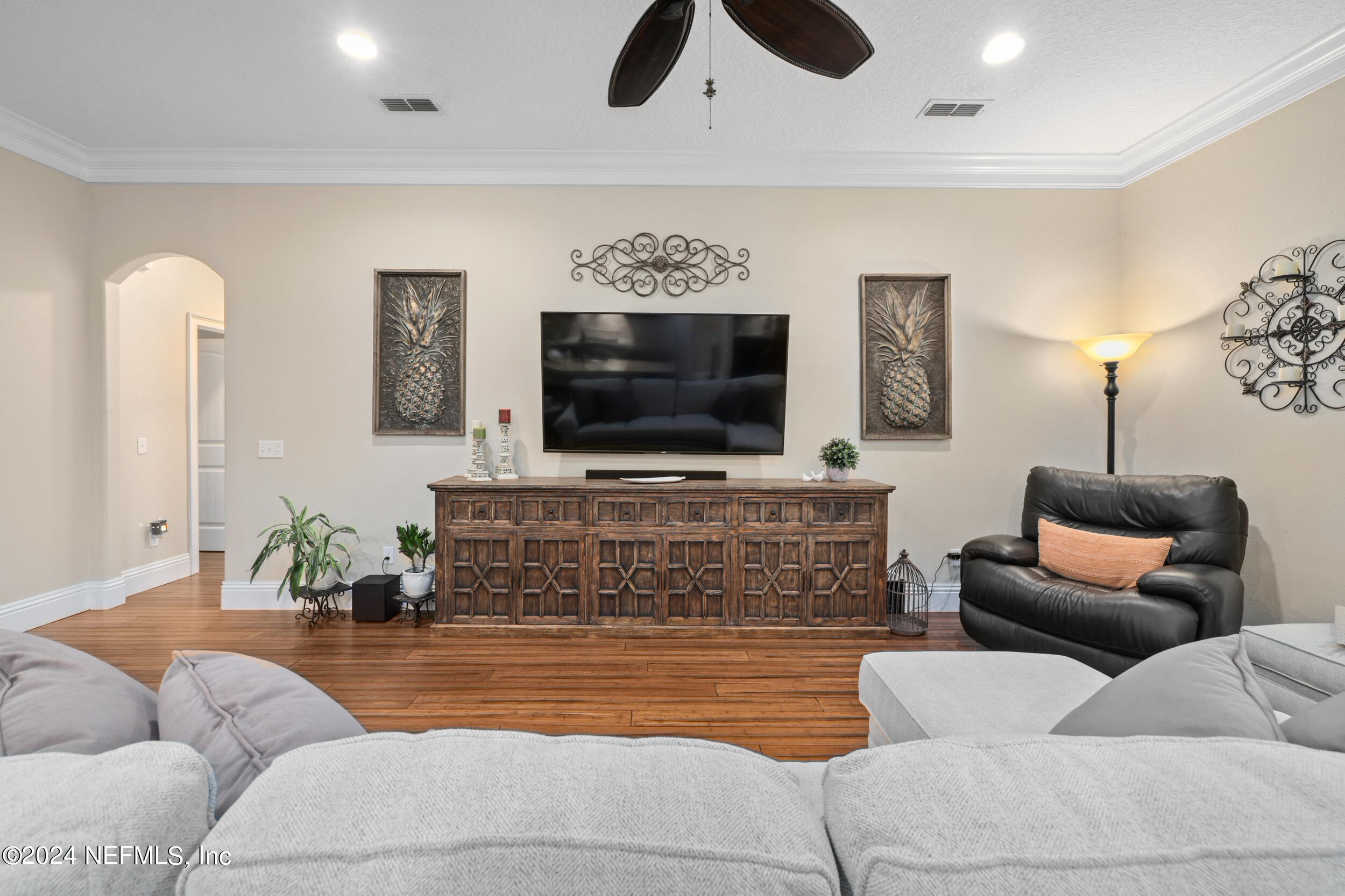 55278 Bartram Trail Callahan, FL 32011 - Photo 15 of 88 a living room with furniture and a flat screen tv