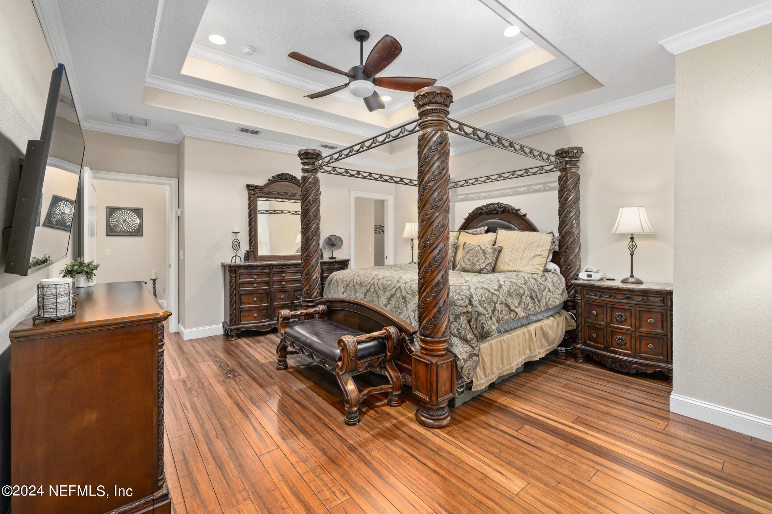 55278 Bartram Trail Callahan, FL 32011 - Photo 26 of 88 a living room with furniture and a flat screen tv
