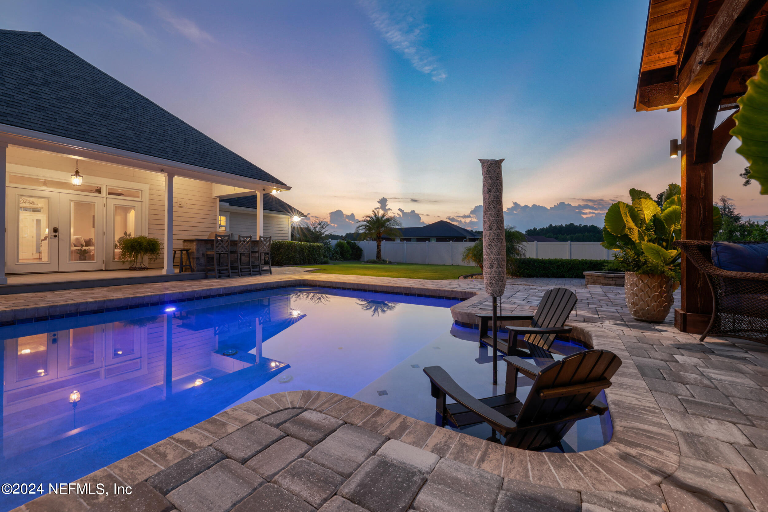 55278 Bartram Trail Callahan, FL 32011 - Photo 3 of 88 a view of a balcony with lake view and a floor to ceiling window