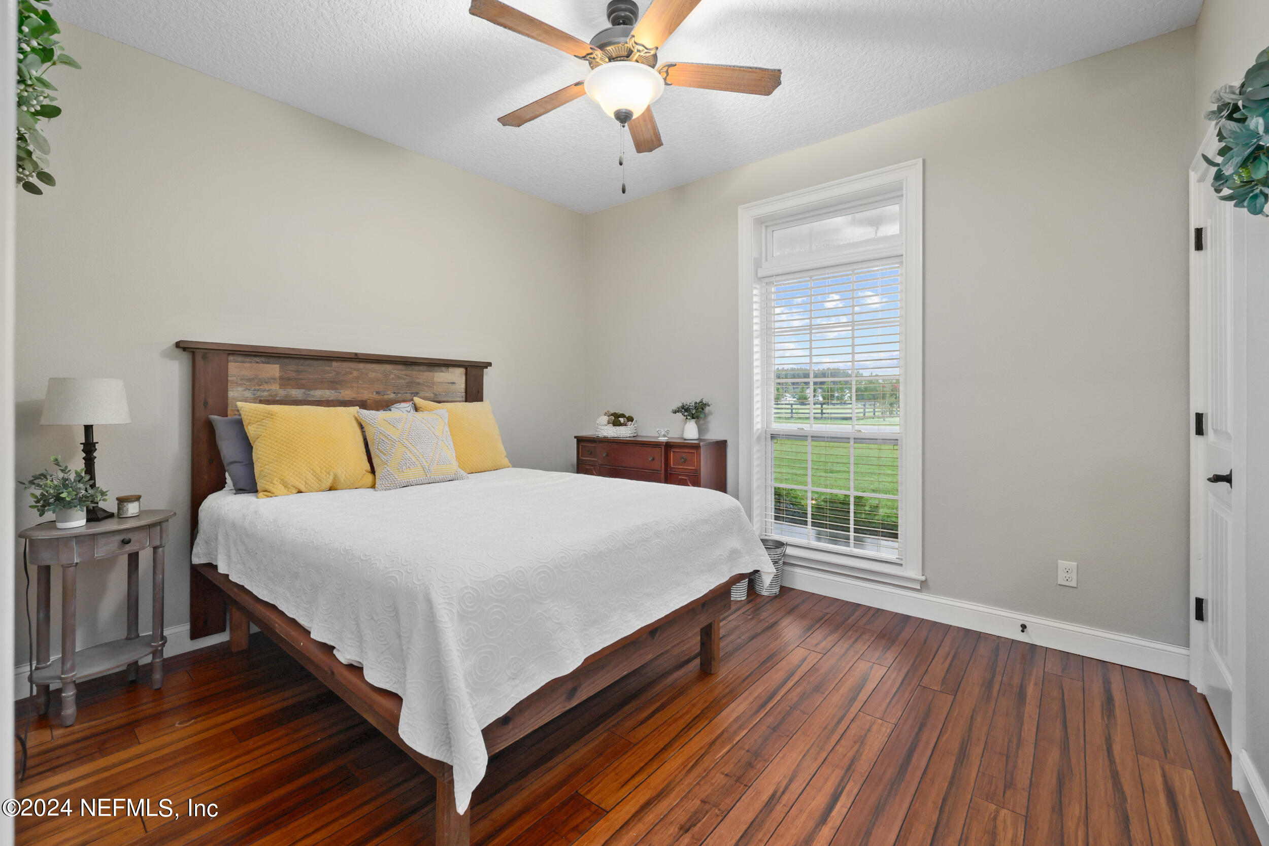 55278 Bartram Trail Callahan, FL 32011 - Photo 36 of 88 a bedroom with a bed and window
