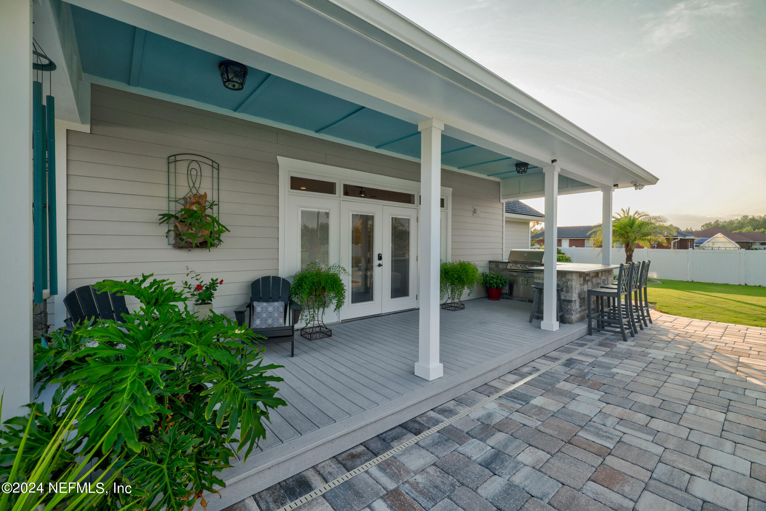 55278 Bartram Trail Callahan, FL 32011 - Photo 47 of 88 a view of a house with backyard porch and sitting area