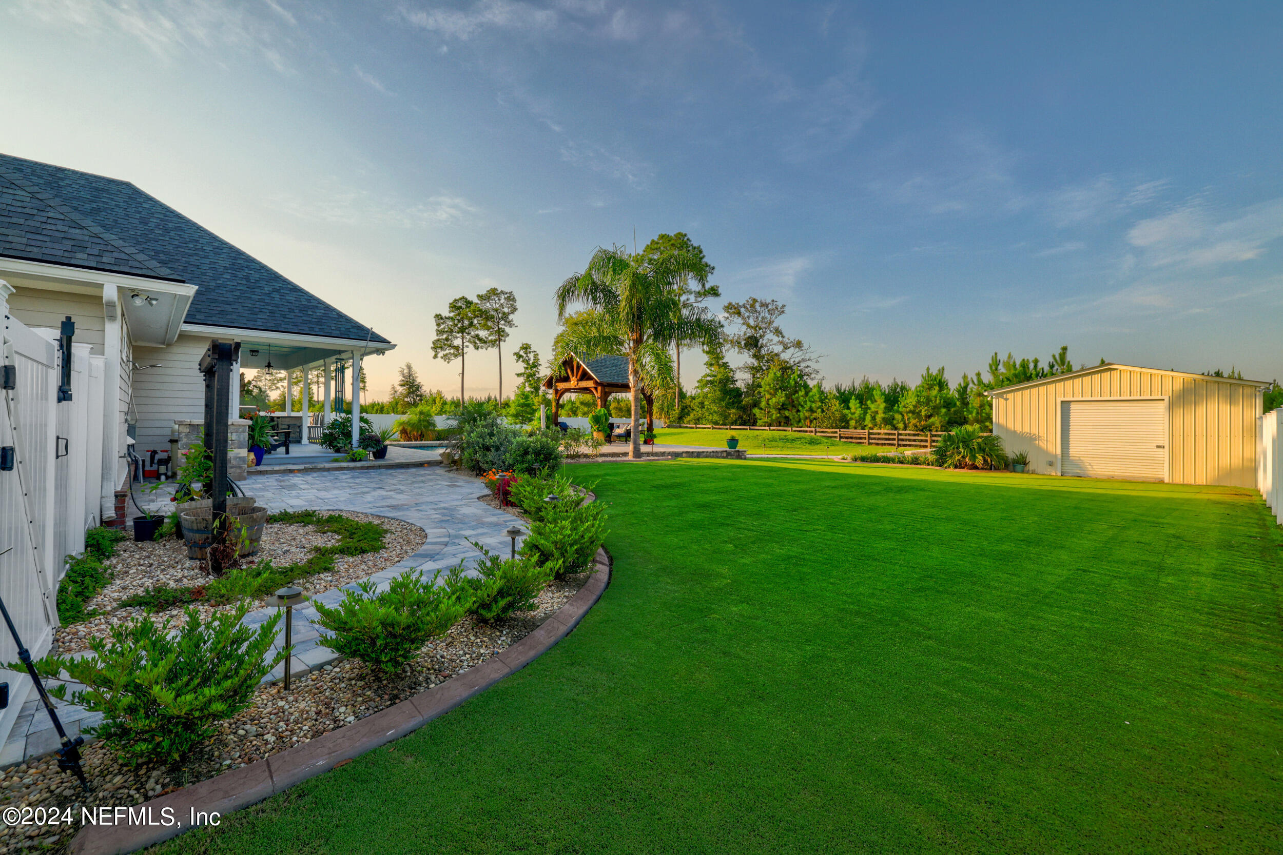 55278 Bartram Trail Callahan, FL 32011 - Photo 49 of 88 a view of a house with a backyard