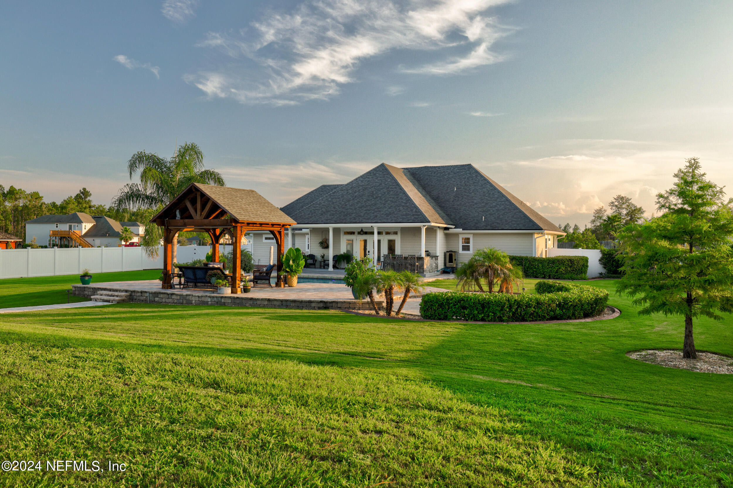 55278 Bartram Trail Callahan, FL 32011 - Photo 51 of 88 a front view of house with yard and green space