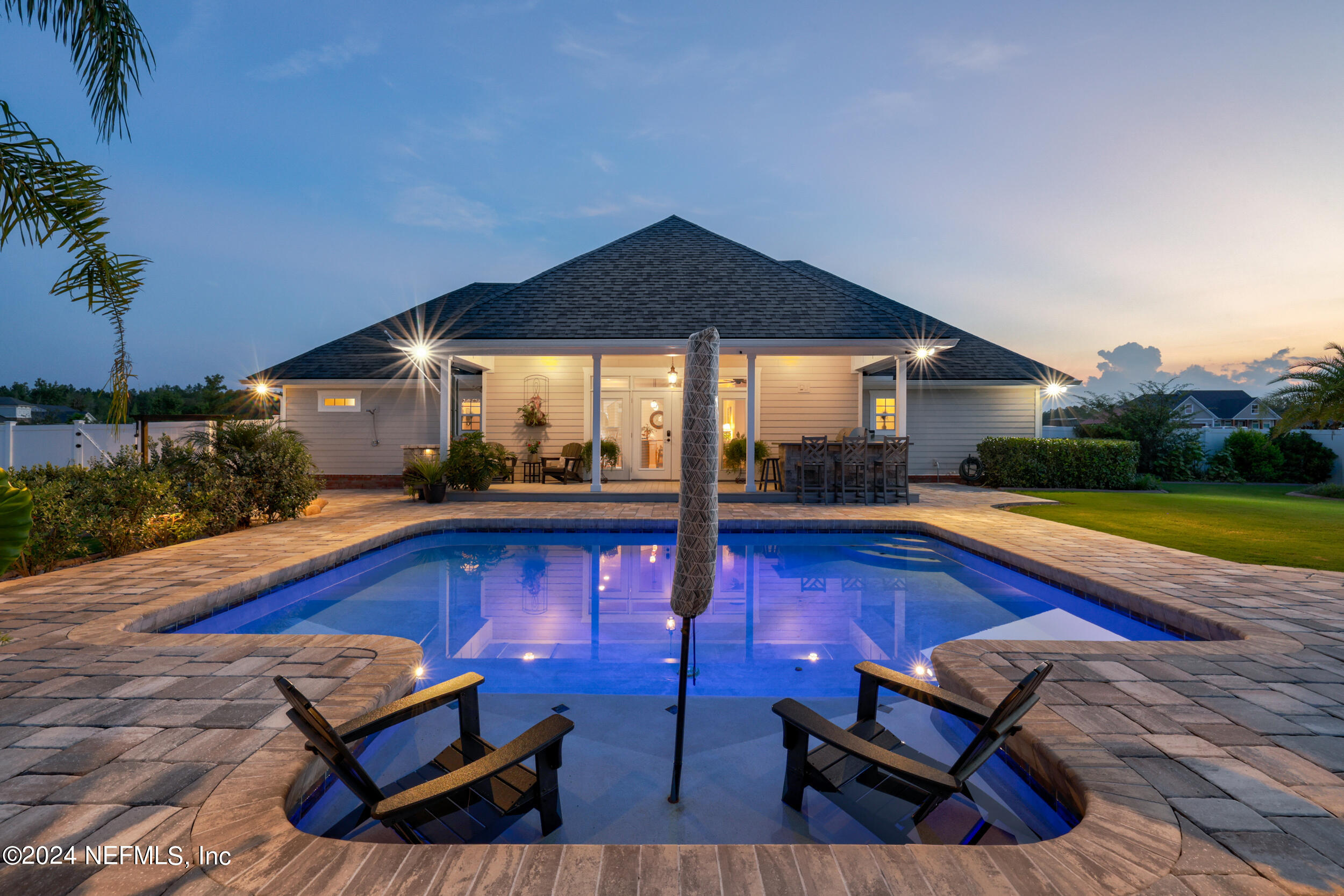 55278 Bartram Trail Callahan, FL 32011 - Photo 55 of 88 a view of swimming pool with seating area and furniture