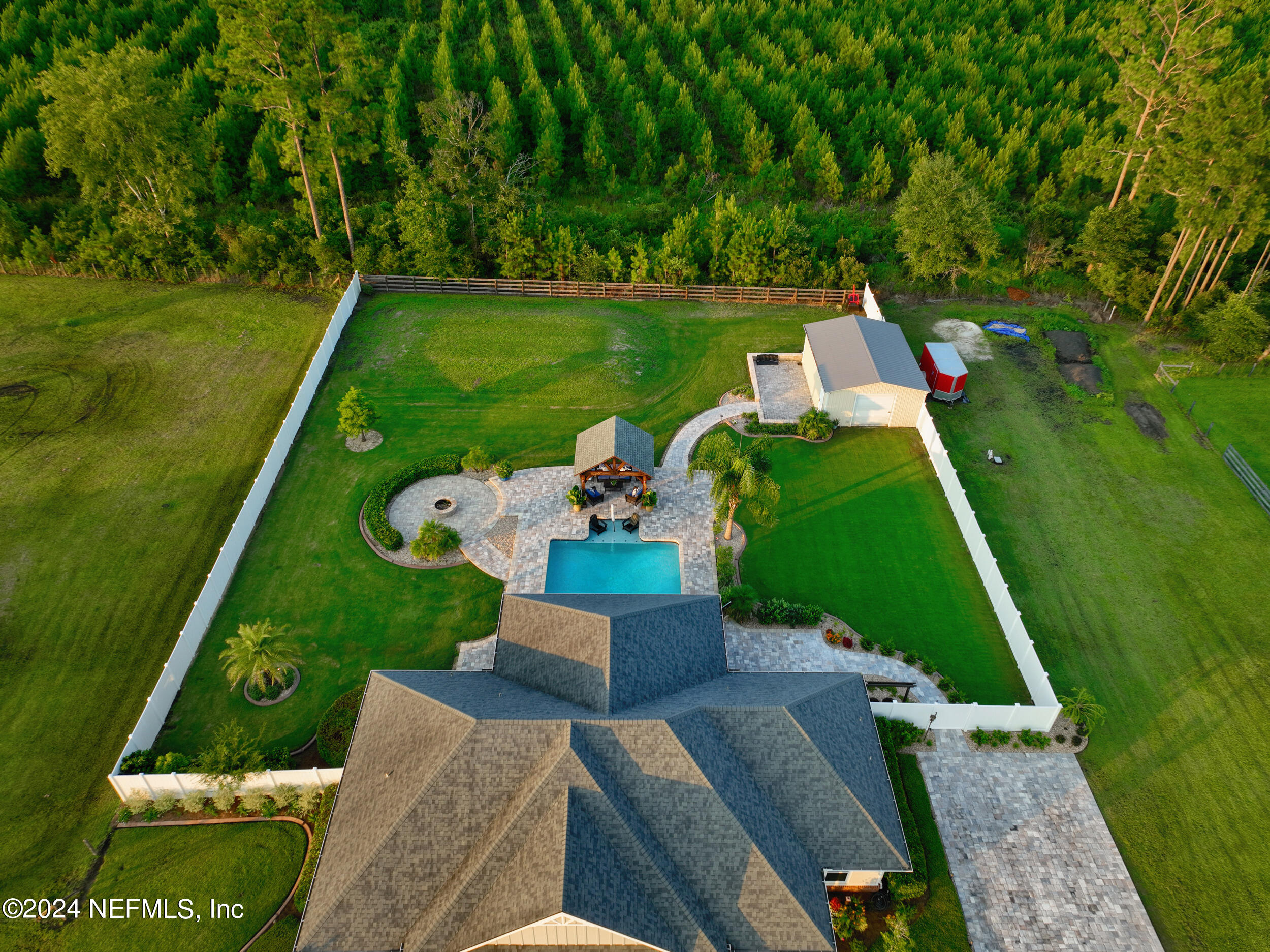 55278 Bartram Trail Callahan, FL 32011 - Photo 6 of 88 swimming pool view with a garden