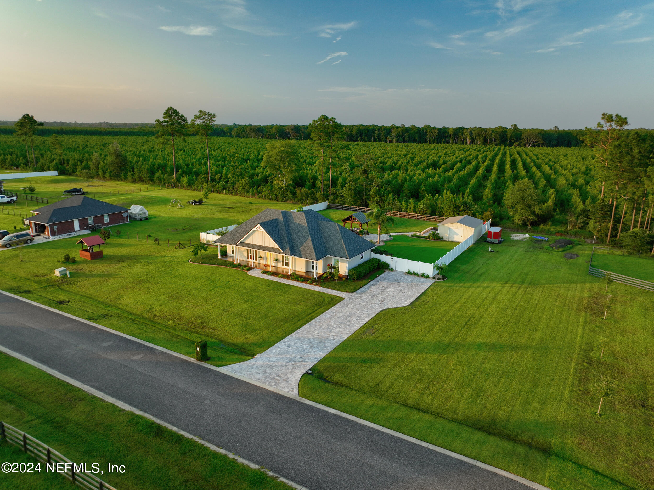 55278 Bartram Trail Callahan, FL 32011 - Photo 80 of 88 an aerial view of a golf course with chairs