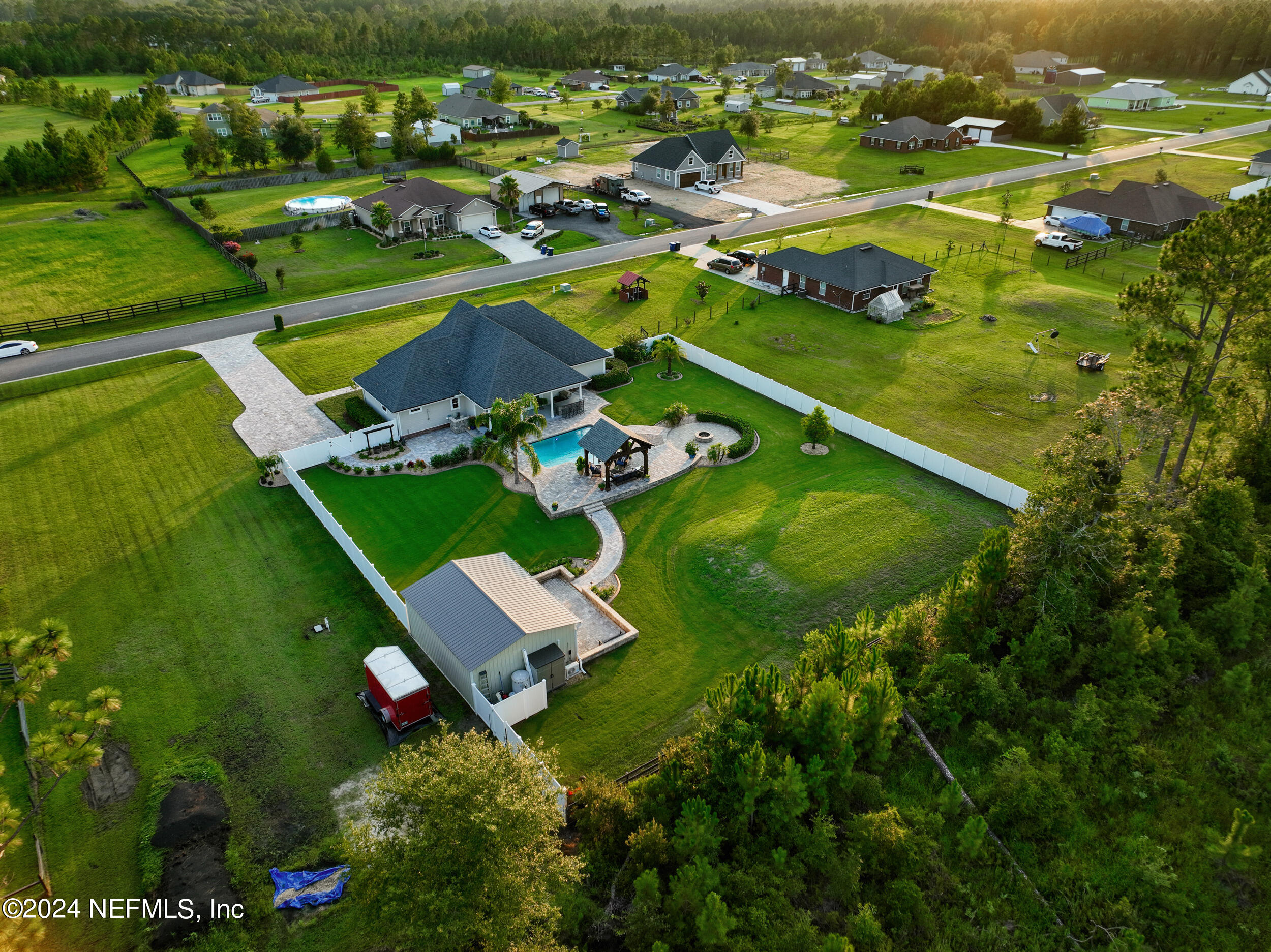 55278 Bartram Trail Callahan, FL 32011 - Photo 84 of 88 an aerial view of a house with a garden
