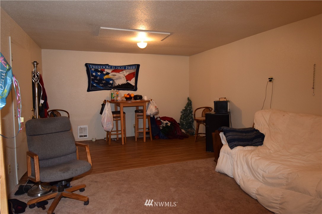 620 Index Avenue Northeast Renton, WA 98056 - Photo 12 of 17 a bedroom with furniture and a bed