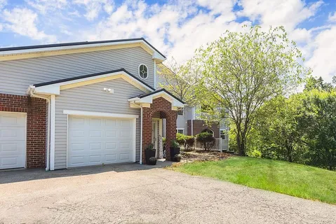 a view of a backyard of a house