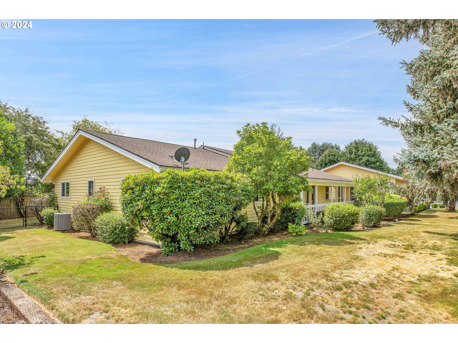 28930 Southeast Powell Valley Road Gresham, OR 97080 - Photo 2 of 38 a view of a house with backyard and garden