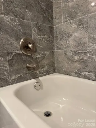 a bathroom with a tub