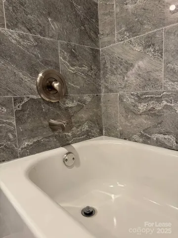 a bathroom with a tub