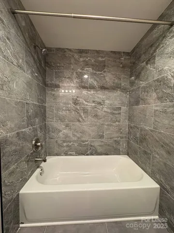 a bathroom with a bathtub