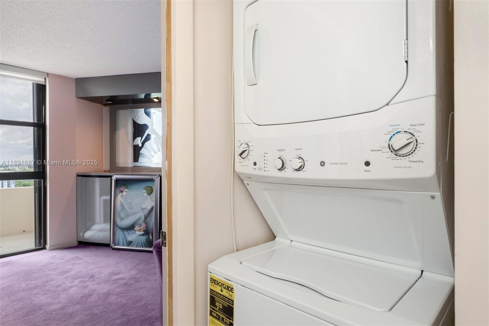 1000 Quayside Terrace, Unit PH9 Miami, FL 33138 - Photo 15 of 27 a utility room with dryer and washer