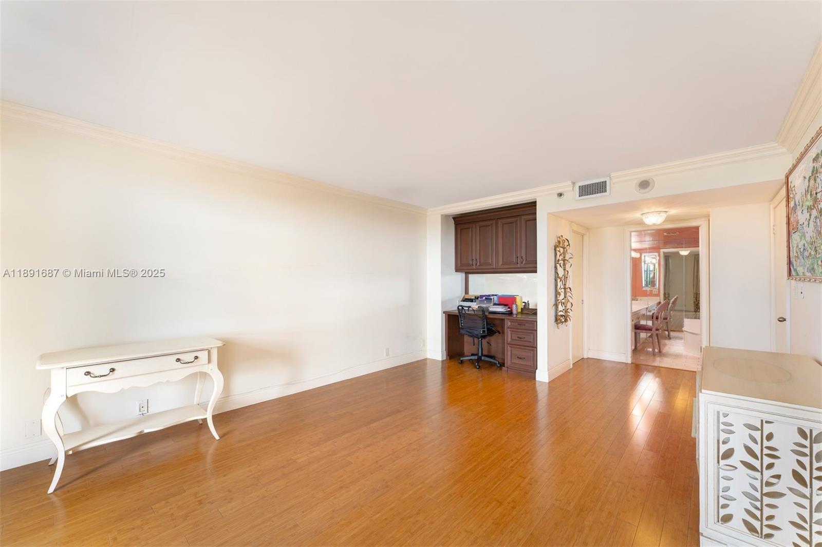 1000 Quayside Terrace, Unit PH9 Miami, FL 33138 - Photo 20 of 27 a living room with furniture and view of kitchen