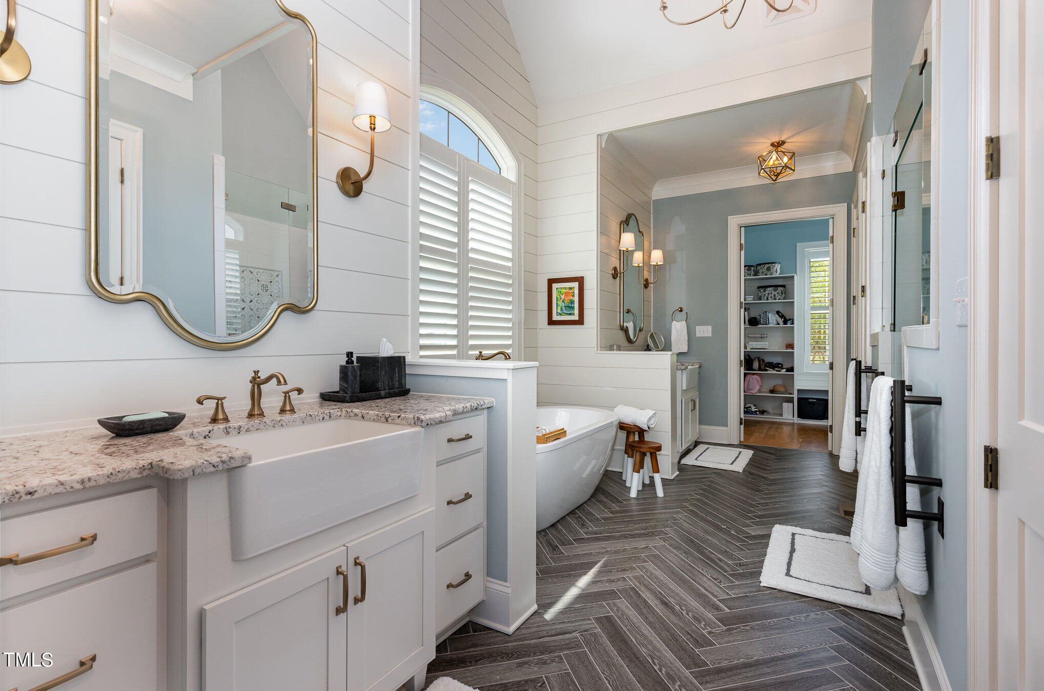 1505 Sweetwater Lane Raleigh, NC 27610 - Photo 25 of 54 A Primary Bath to Envy, Shiplap Walls, Stunning Herringbone Style Tile Floors and Beautiful Light Fixtures.