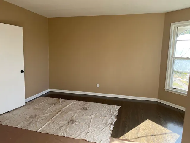 an empty room with windows