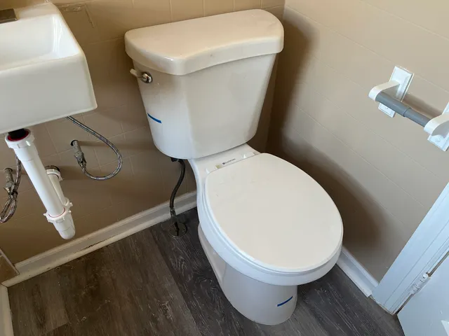 a close view of a toilet in a bathroom