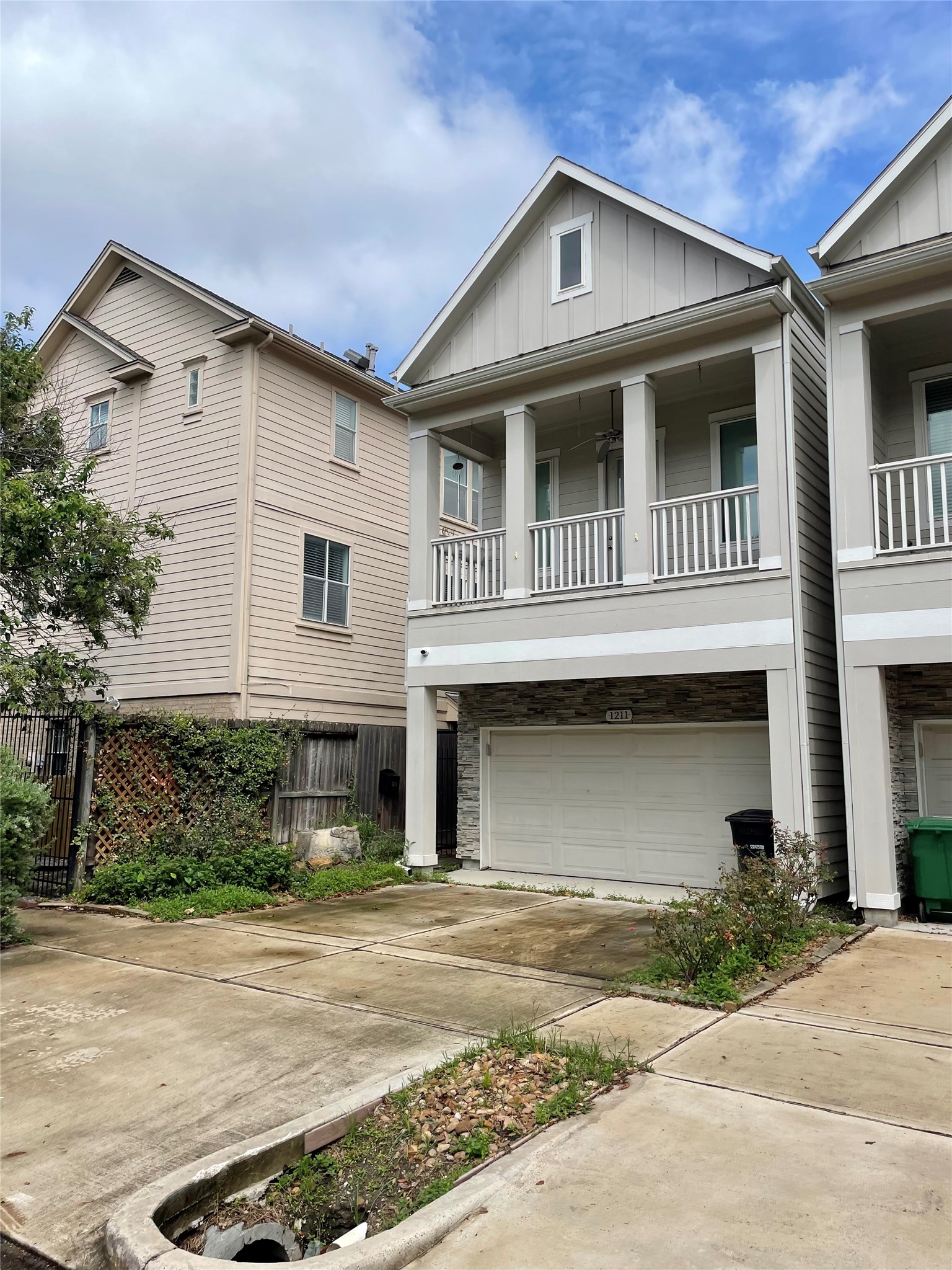1211 Marconi Street Houston, TX 77019 - Photo 1 of 42 a front view of a house with a yard