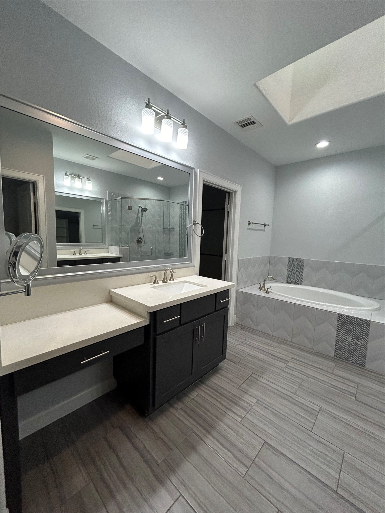 1211 Marconi Street Houston, TX 77019 - Photo 25 of 42 a large bathroom with a large tub and sink