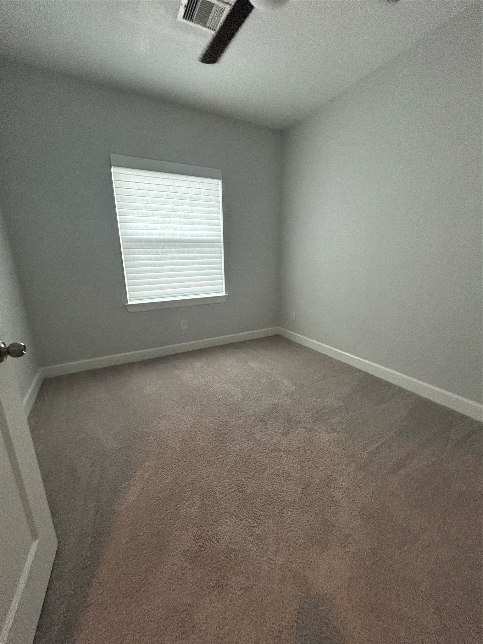 1211 Marconi Street Houston, TX 77019 - Photo 32 of 42 an empty room with a window