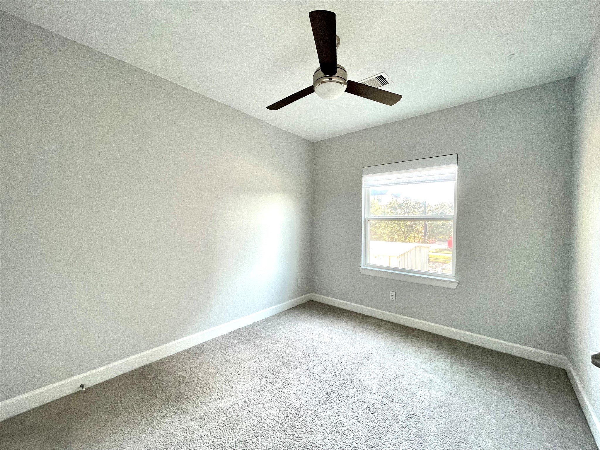 1211 Marconi Street Houston, TX 77019 - Photo 36 of 42 an empty room with a window