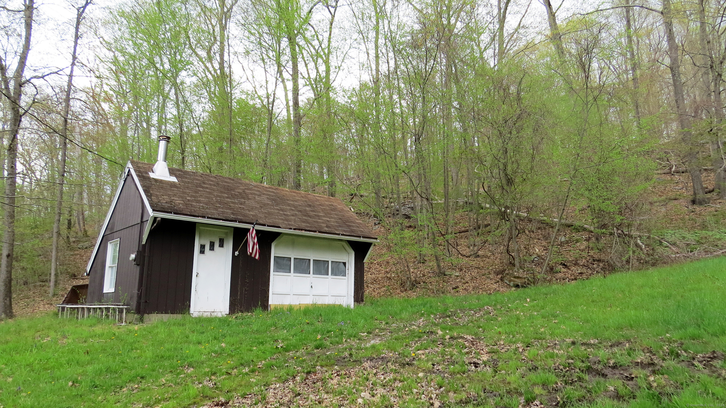 198 Cook Lane Beacon Falls, CT 06403 - Photo 5 of 7 a front view of a house with garden