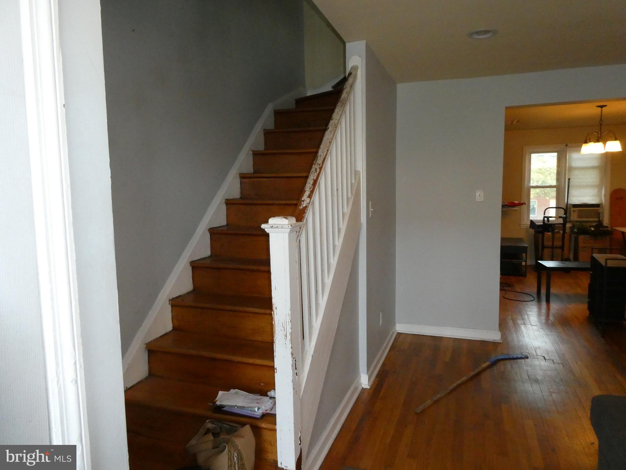 604 Cheraton Road Baltimore, MD 21225 - Photo 3 of 9 a view of entryway and hall with wooden floor