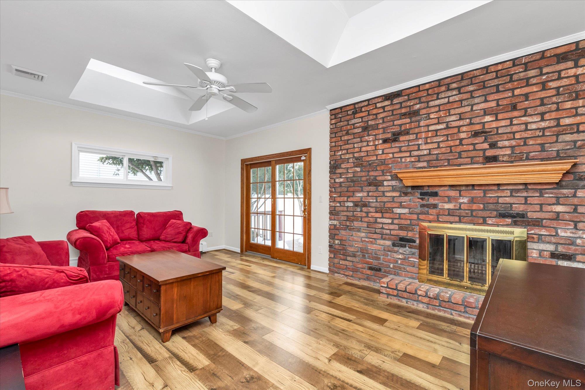 111 Cocks Lane Locust Valley, NY 11560 - Photo 11 of 23 a living room with furniture and a fireplace