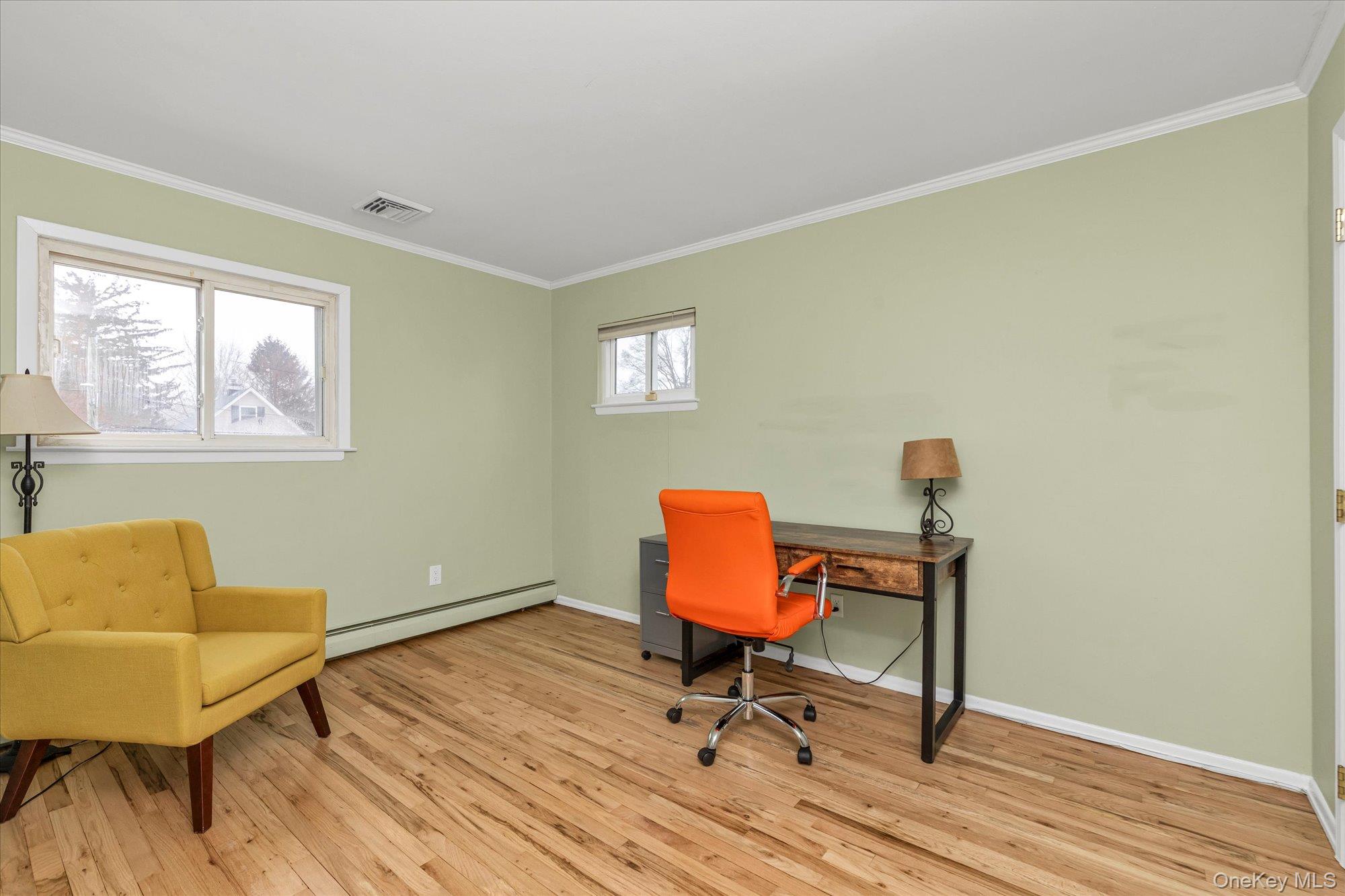 111 Cocks Lane Locust Valley, NY 11560 - Photo 19 of 23 a view of a workspace with furniture and a window