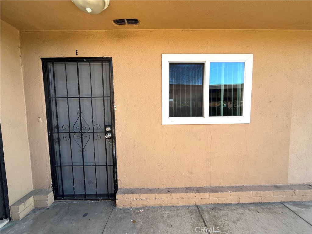 4329 East 55th Street, Unit E Maywood, CA 90270 - Photo 3 of 12 a view of an entrance of house