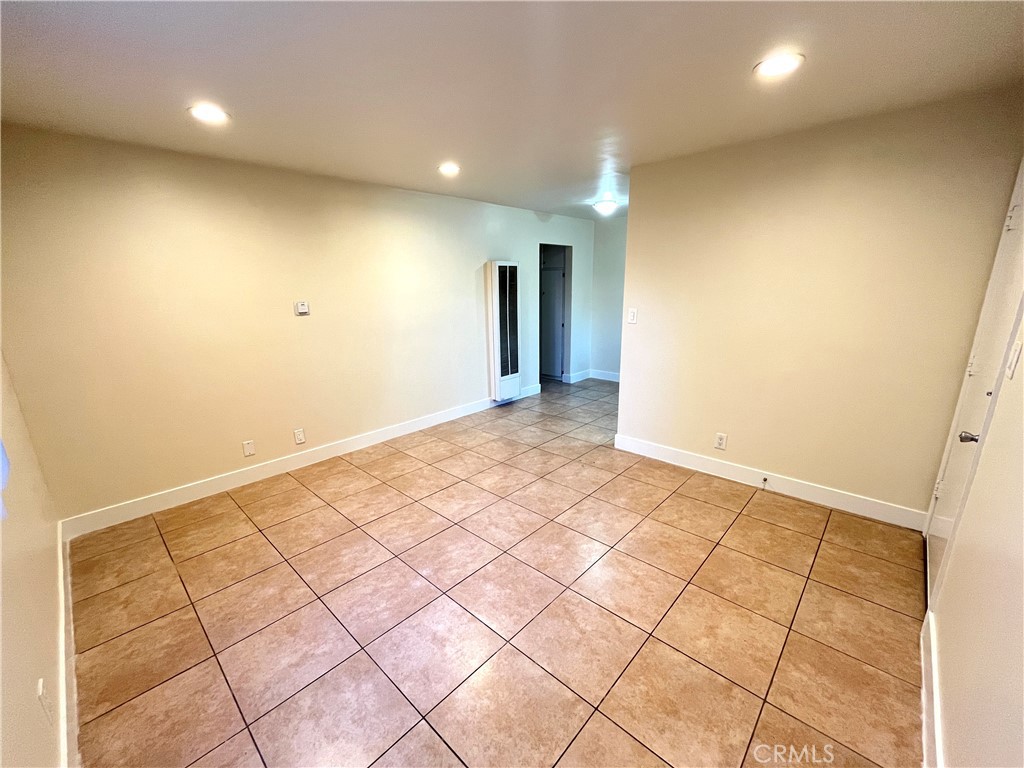 4329 East 55th Street, Unit E Maywood, CA 90270 - Photo 5 of 12 a view of an empty room
