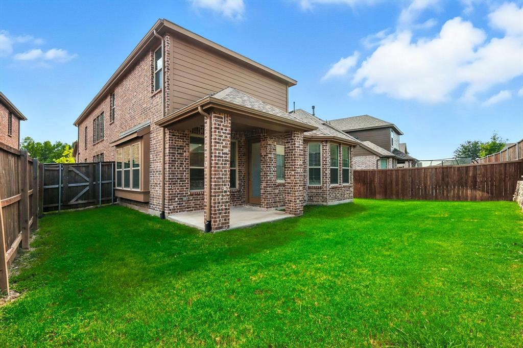 2328 Neff Lane Forney, TX 75126 - Photo 27 of 30 a view of a house with backyard and garden