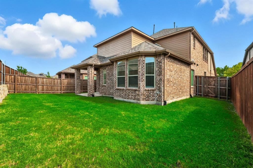 2328 Neff Lane Forney, TX 75126 - Photo 29 of 30 a front view of a house with garden