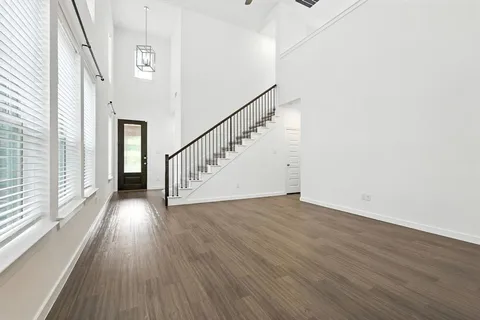 a view of entryway with wooden floor