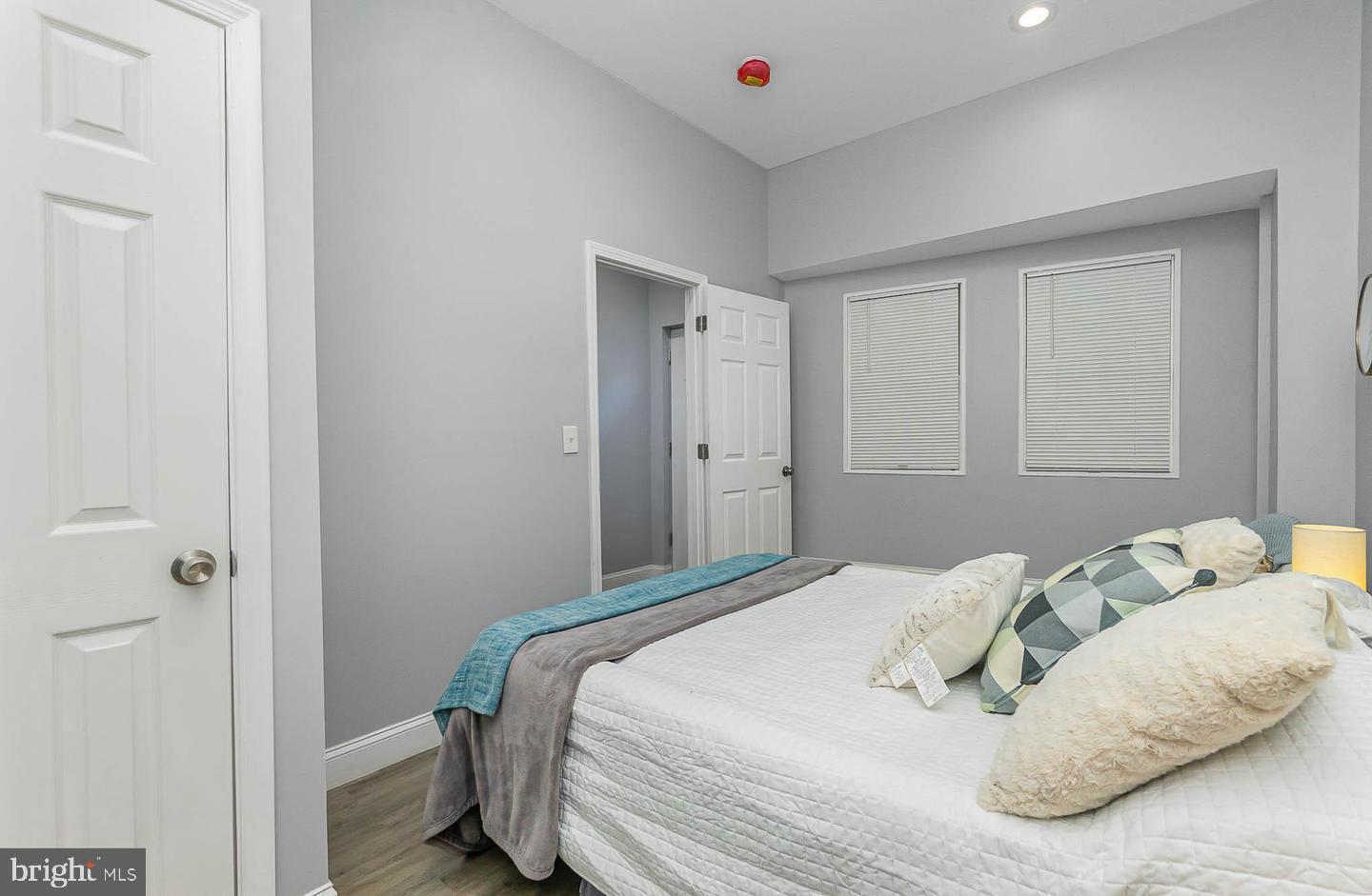 1709 Bank Street Baltimore, MD 21231 - Photo 7 of 49 a bedroom with a bed and a closet