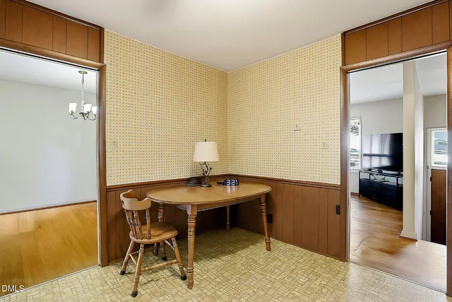 a view of a workspace with furniture