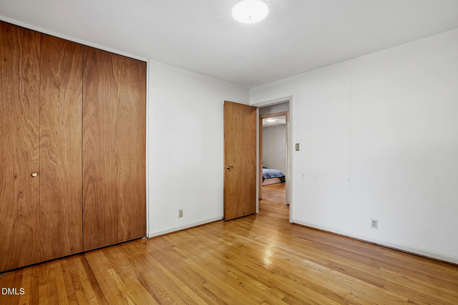3216 Broyhill Circle Raleigh, NC 27604 - Photo 17 of 32 a view of an empty room with wooden floor