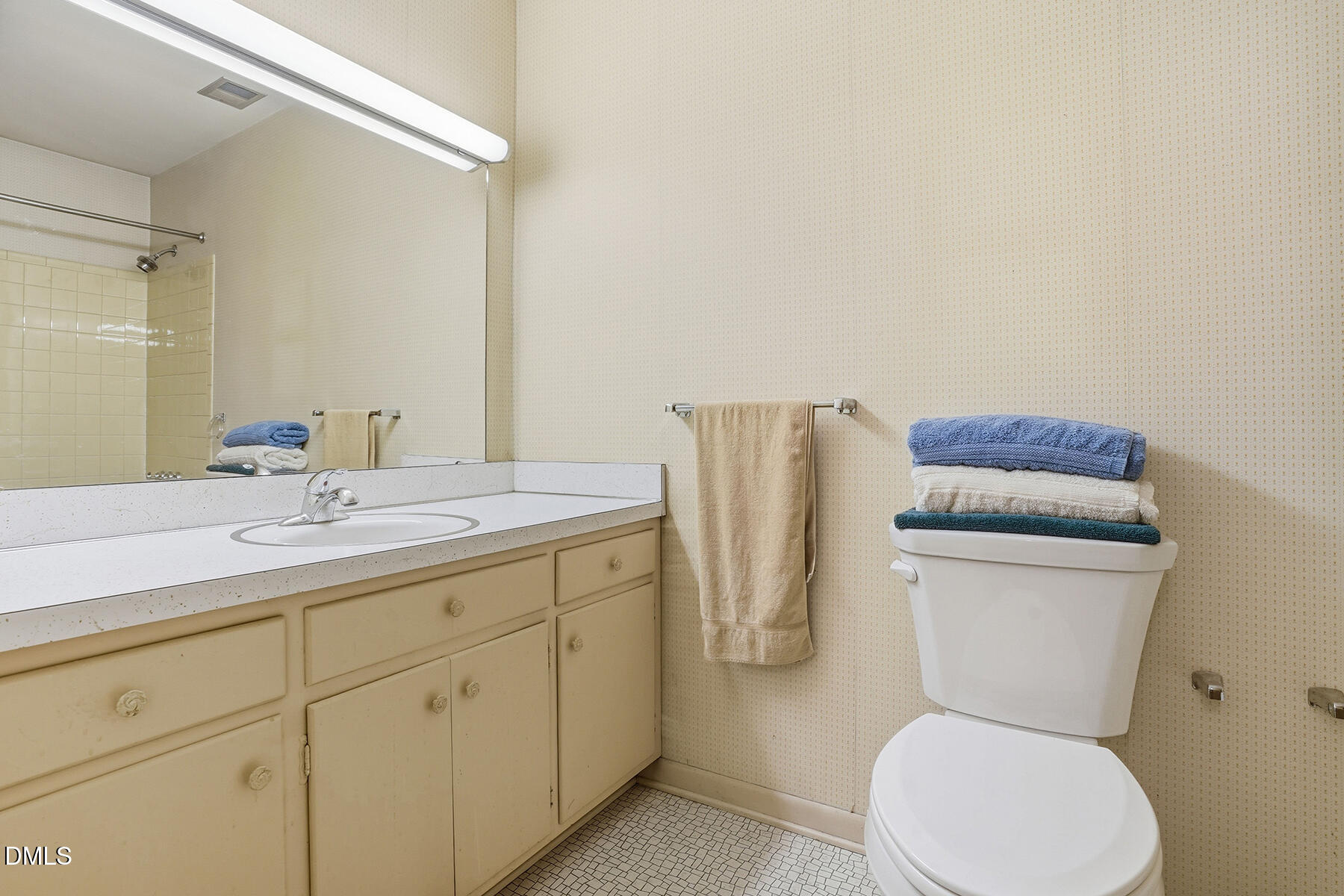 3216 Broyhill Circle Raleigh, NC 27604 - Photo 18 of 32 a bathroom with a toilet sink and mirror