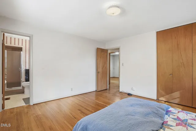 a view of livingroom with hardwood floor and hallway