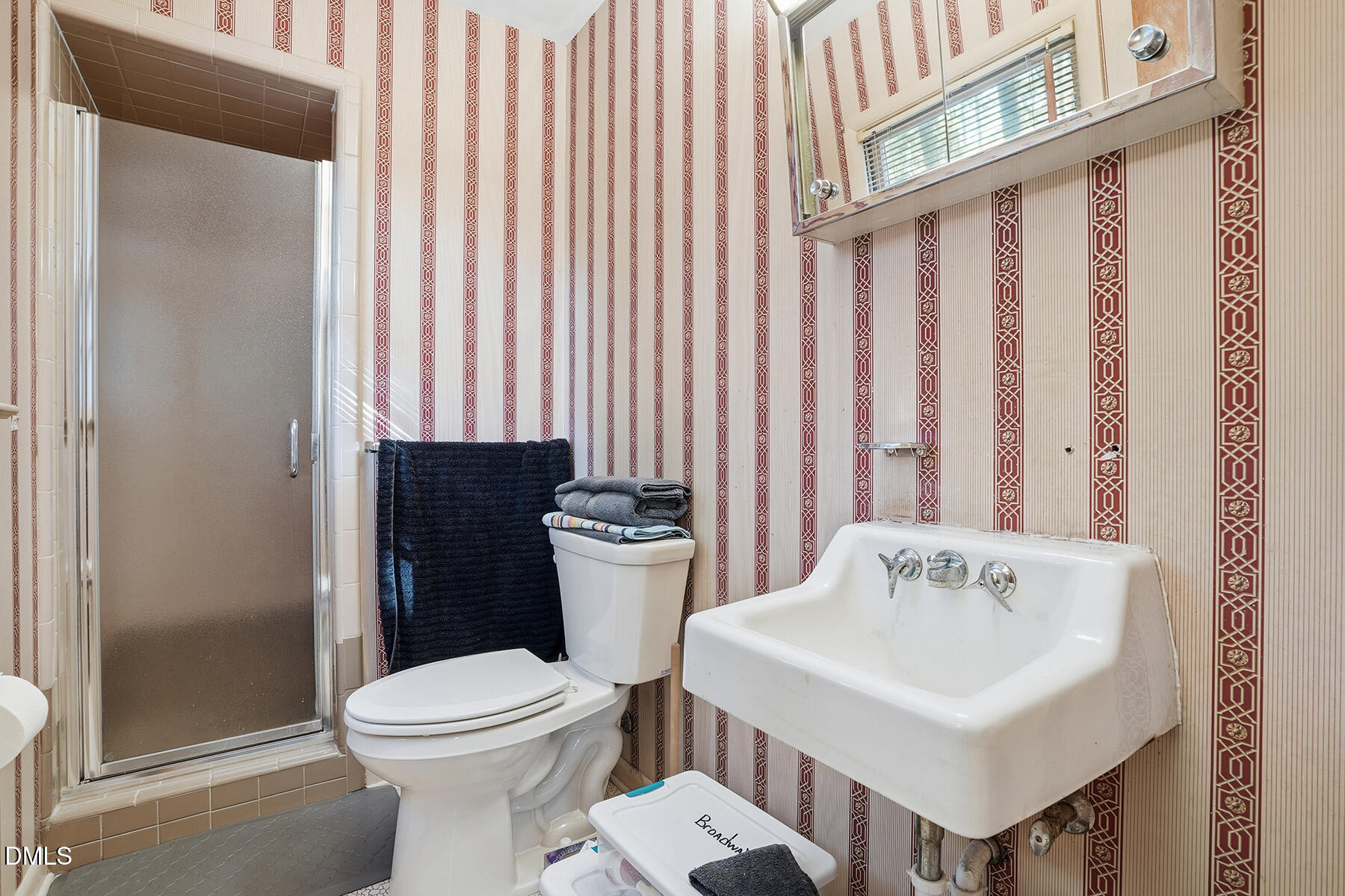 3216 Broyhill Circle Raleigh, NC 27604 - Photo 23 of 32 a white toilet sitting next to a bathroom sink